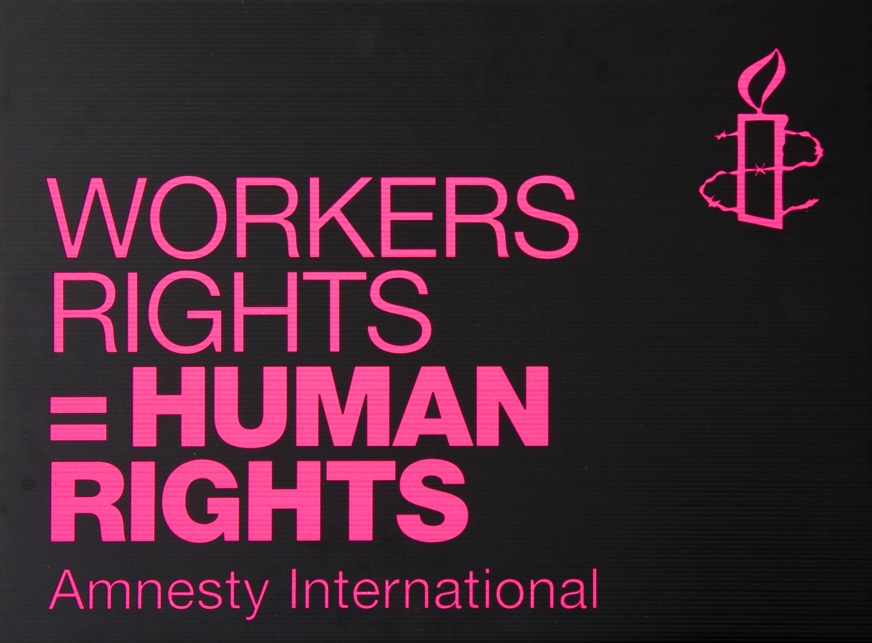 Poster mit Aufschrift "Workers Rights=Human Rights"