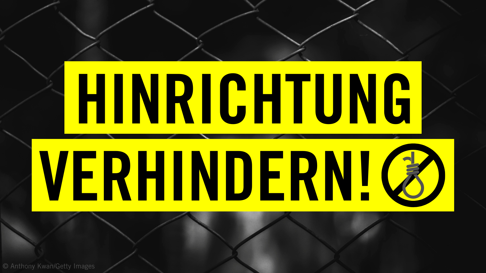 Zwei gelbe Balken übereinander mit der Aufschrift "Hinrichtungen verhindern!" und einem Pictogram, das einen durchgestrichenen Strick darstellt. Der Hintergrund ist schwarz, es ist ein Zaun leicht erkennbar.