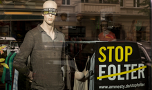 Stop Folter Schaufenster-Aktion