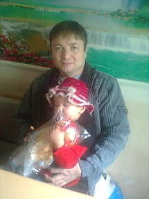 Dilmurat Khaidarov mit seiner Tochter