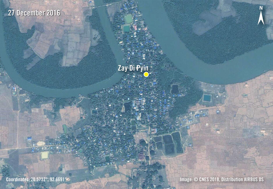 Satellitenbild eines Dorfes neben einem Fluss