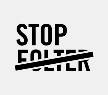 Schriftzug "Stop Folter", Folter dabei durchgestrichen