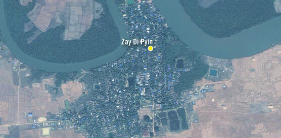 Satellitenbild eines Dorfes neben einem Fluss