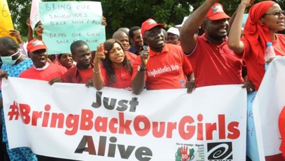 "Bringt unsere Mädchen lebend zurück": Protest am 6.5.2014 in Abuja (Nigeria) gegen die Entführung von mehr als 200 Schülerinnen