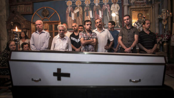 Trauerfeier in einer Kirche in Gaza-Stadt am 27. Juli 2014. Jalila Ayad wurde nach einem Luftangriff tot in ihrem Haus gefunden.