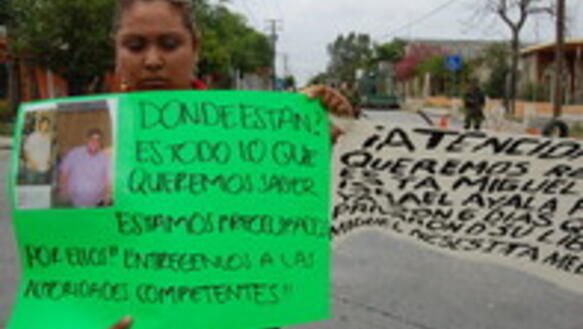 Eine Angehörige eines Verschwundenen protestiert in Nuevo Laredo, Mexiko, März 2009 