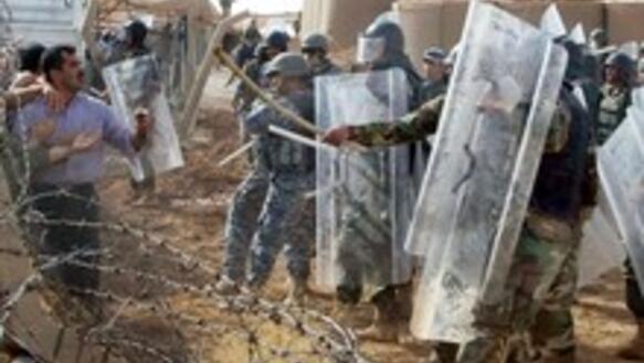 Irakische Sicherheitskräfte bedrohen Bewohner des Camps Ashraf, 2009