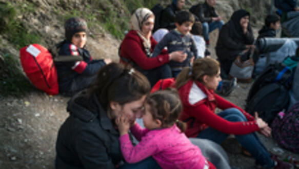 Syrische Flüchtlinge, die im März 2016 auf der griechischen Insel Lesbos auf ihre Registrierung warten