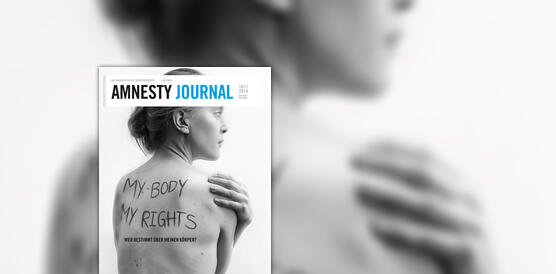 Amnesty Journal September 2014, Frau mit beschriftetem Rücken